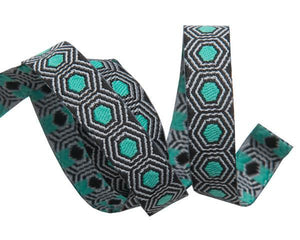 Tortois Dots, Mint on Black - 3/8in Jacquard Ribbon, from Slow and Steady by Tula Pink for Renaissance Ribbons